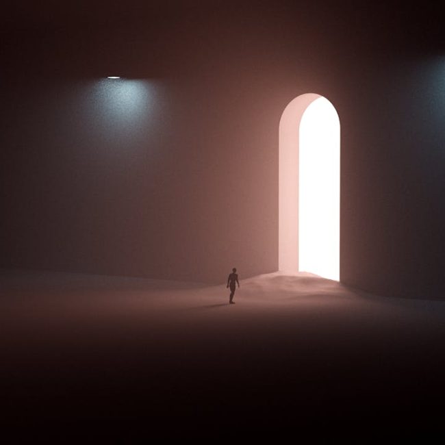 A surreal scene with a silhouetted man approaching a bright arched doorway in a dark room.